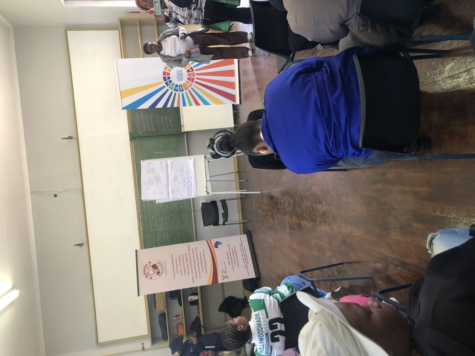 Volunteers distributing food parcels to local families