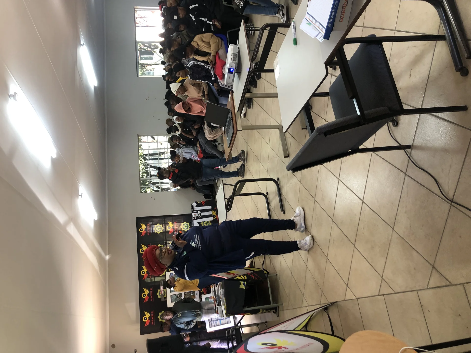 Children learning in a classroom setting at a community education centre